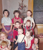 memoir, memoir writing, memoir contest winner, Sharon Mortz I’m in the bottom row looking at Doug on my right. Don is on my left. Marcia is in the top row with short dark hair. Christmas 1959